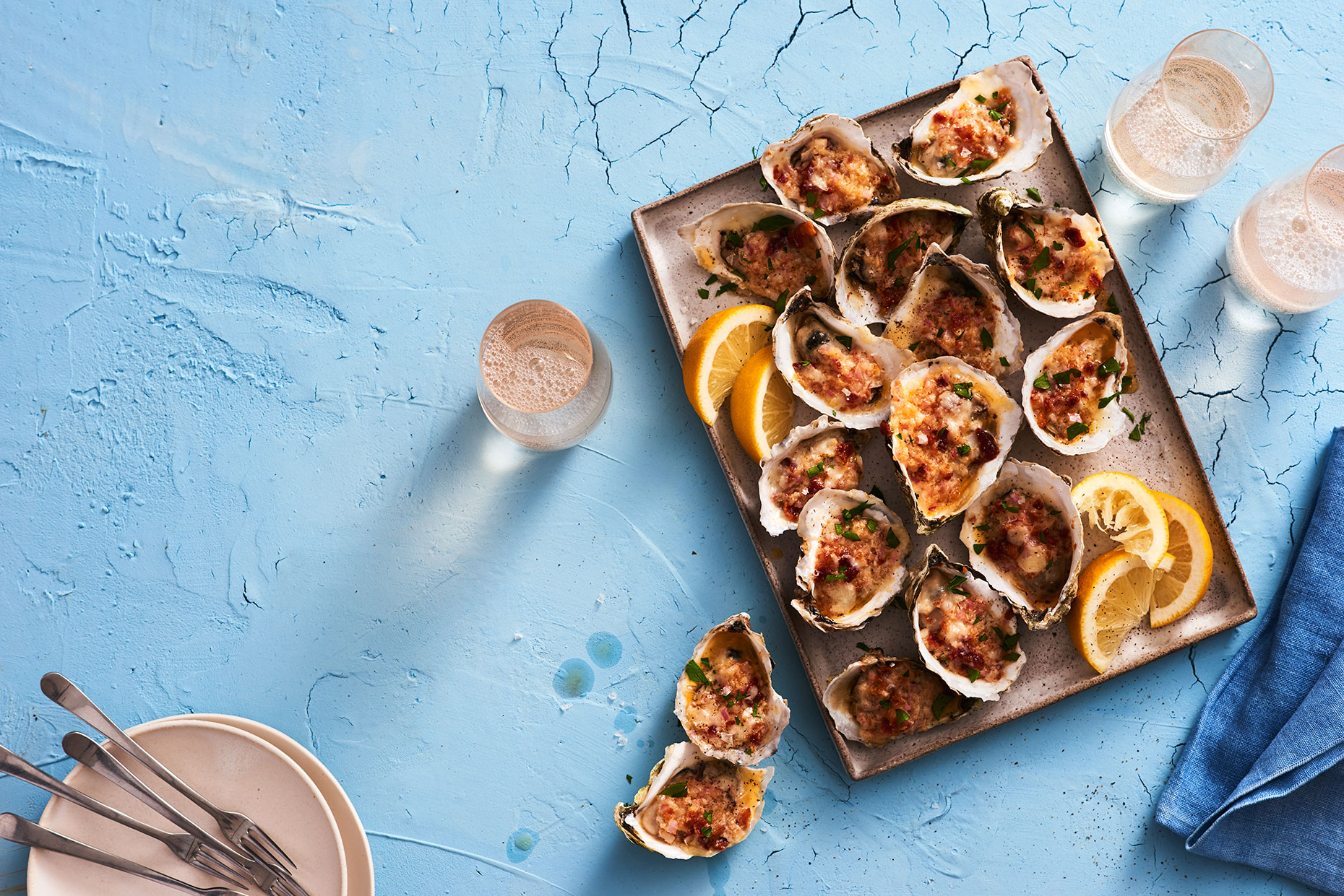 Wine Enthusiast Sea Fare Article about baked oysters, by Food Photographer Adrian Mueller New York